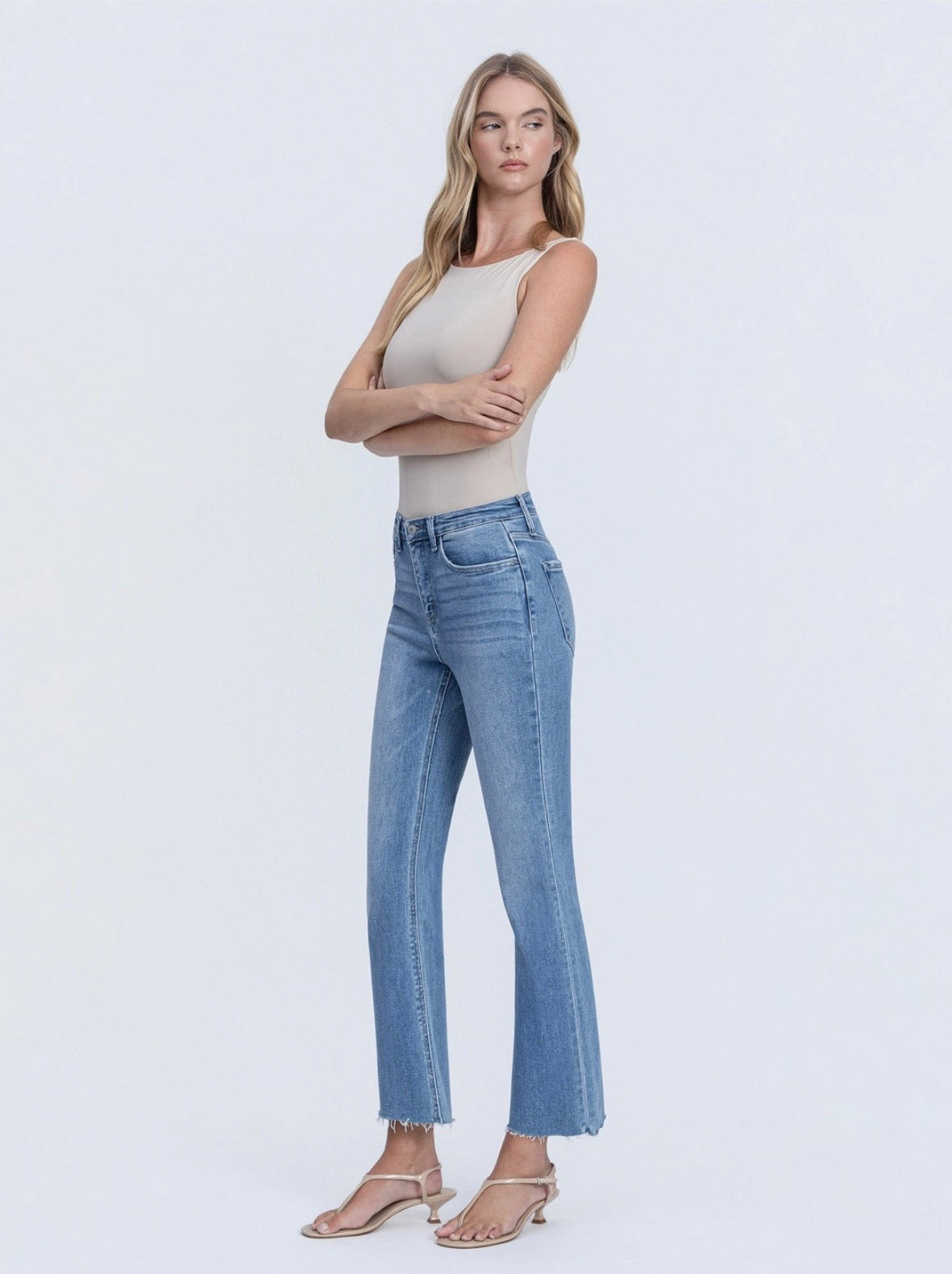 High Rise Clean Cut Raw Hem Crop Flare Jeans